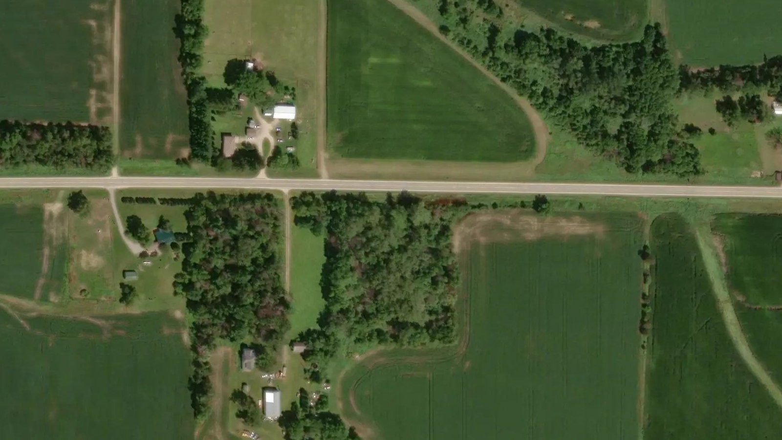 Satellite view: a lone property on a country lane